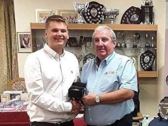 Kieran Rollings was presented with the Disability Bowls Englands Player of the Year award by Steve Watson