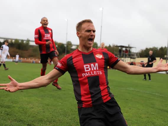 Brett Solkhon celebrates scoring on of his three penalties as Kettering Town beat Hednesford Town 4-0 in the fourth qualifying round of the Emirates FA Cup. Pictures by Peter Short