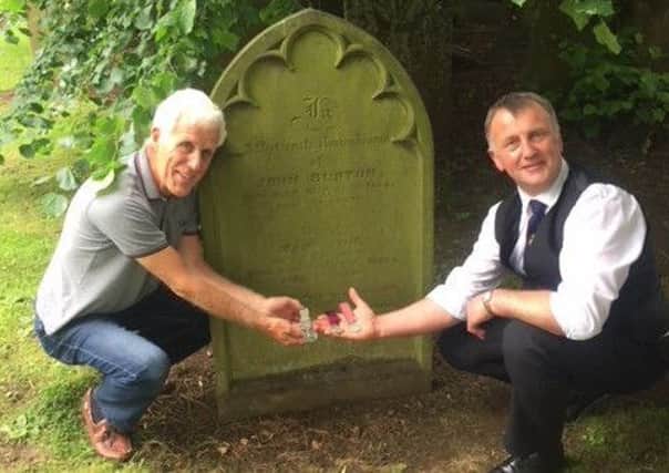 Jason Robinson (right) with his mum's third cousin removed Richard Burton, who he met for the first time, at their ancestor's grave. NNL-181010-103737005