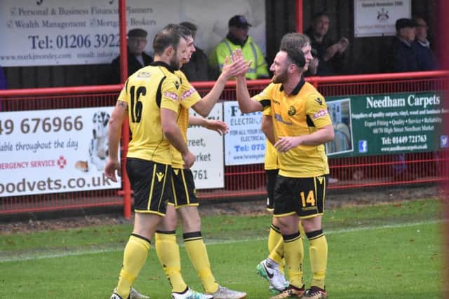 Albie Hopkins takes the congratulations after scoring AFC Rushden & Diamonds' fifth goal in the fine 5-1 success at Needham Market last weekend. Picture courtesy of HawkinsImages