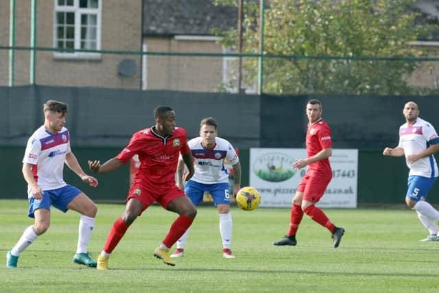Action from the 1-1 draw between AFC Rushden & Diamonds and Barwell