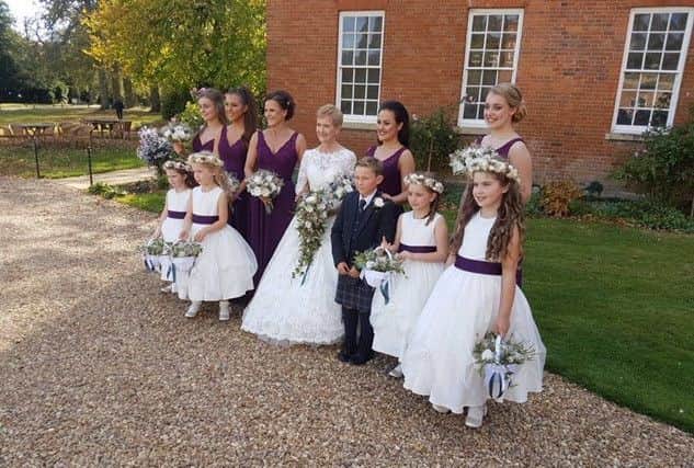 Pauline and the bridal party. NNL-181015-140746005
