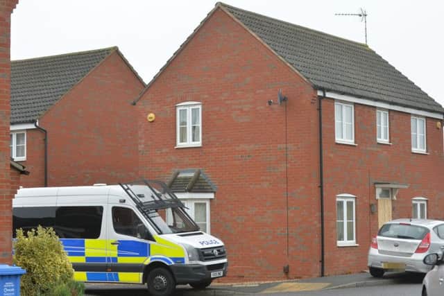 Officers remain at the scene in Scott Avenue, Rothwell