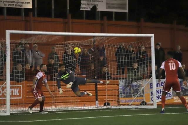Tamworth goalkeeper Jas Singh saves Michael Richens' first-half header during Kettering Town's 0-0 draw at The Lamb. Picture by Peter Short