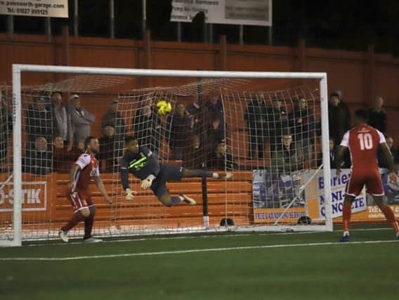 Tamworth goalkeeper Jas Singh saves Michael Richens' first-half header during Kettering Town's 0-0 draw at The Lamb. Picture by Peter Short