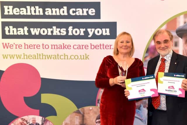 Kate and David with the Healthwatch award and commendations