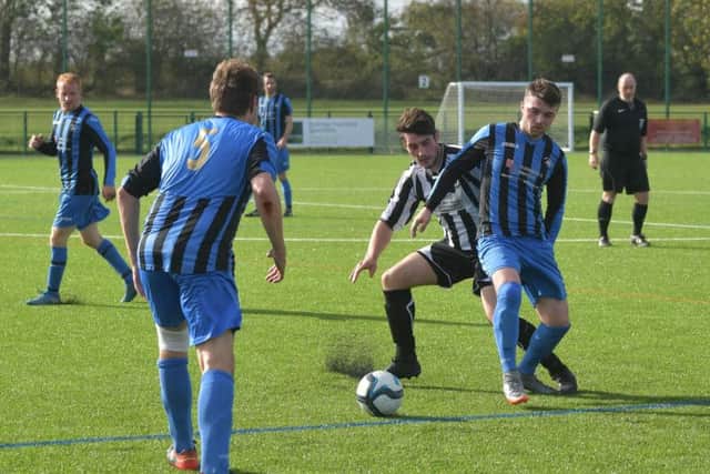 Action from Moultons 9-0 victory over Corby Pegasus. Picture by Dave Ikin