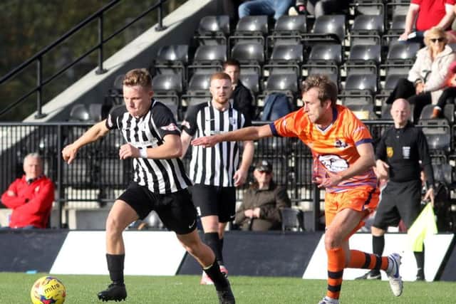 Jordon Crawford in action for Corby Town during last weekend's 3-2 home defeat to Yaxley in the FA Trophy. Picture by Alison Bagley