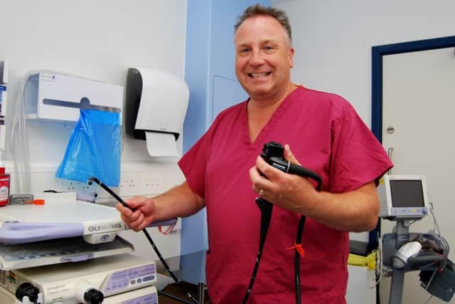 Kettering General Hospitals Clinical Director for Bowel Cancer Screening and Consultant Gastroenterologist Dr Andrew Dixon in the hospitals 5th Endoscopy Room. NNL-181018-123612005