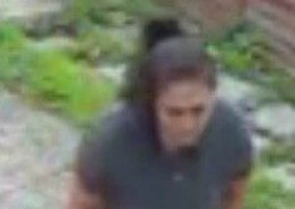 Police want to speak to this woman about an alleged theft in Turner Road, Wellingborough