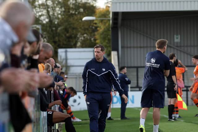 Corby Town boss Steve Kinniburgh was not entirely happy despite seeing his team fight back from 3-1 down to earn a 3-3 draw at Dunstable Town