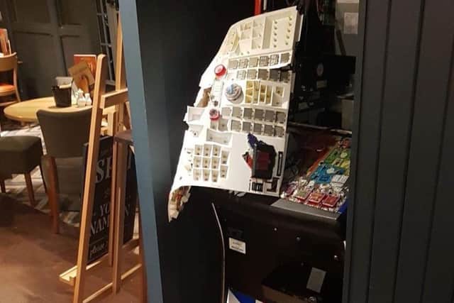 A smashed-up fruit machine at the Shire Horse in a previous raid.