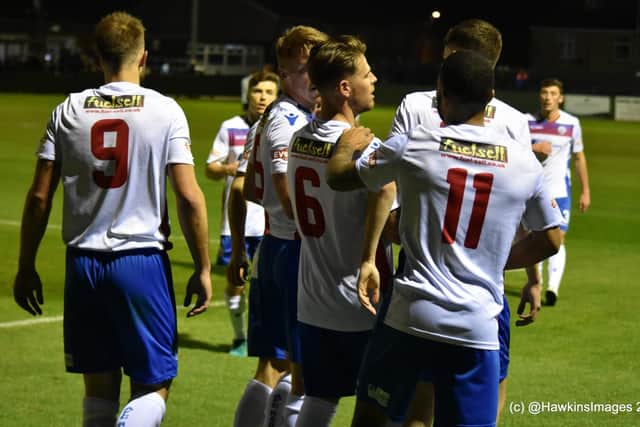 Declan Rogers takes the congratulations after scoring AFC Rushden & Diamonds' second goal in the 3-1 victory over Coalville Town at Hayden Road. Picture courtesy of HawkinsImages