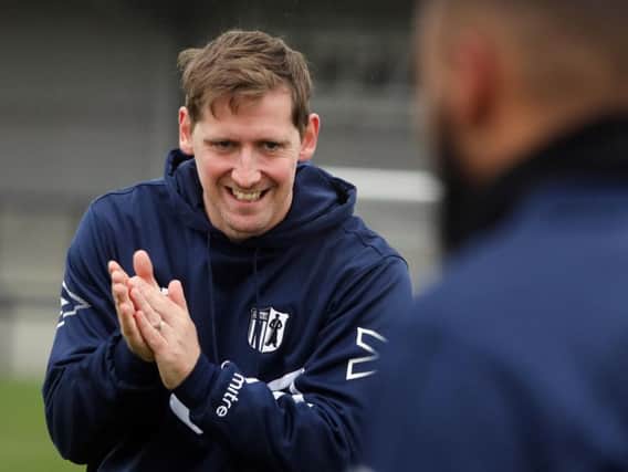 Steve Kinniburgh was a happy man after Corby Town took over at the top of the Evo-Stik League South Division One Central. Pictures by Alison Bagley