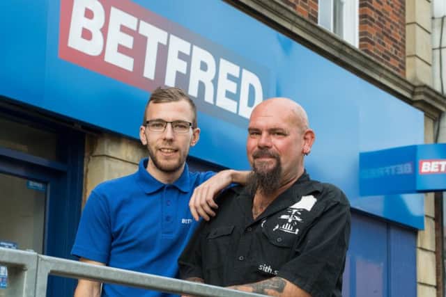 Tom Capps with Steve Patrick outside Betfred in Kettering