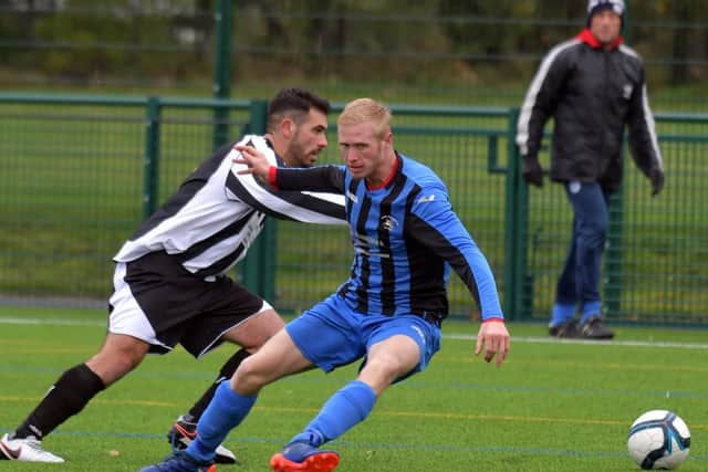 Action from Moulton's 6-0 victory over Corby Peagsus in the Premier Division. Picture by Dave Ikin