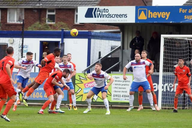 Action from AFC Rushden & Diamonds' 2-1 victory over St Ives Town in the FA Trophy last weekend. Picture by Alison Bagley
