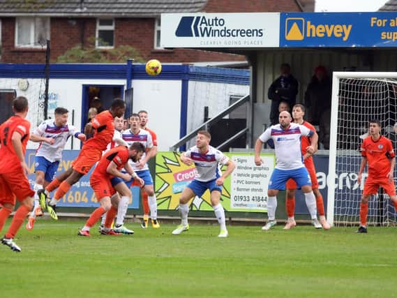 Action from AFC Rushden & Diamonds' 2-1 victory over St Ives Town in the FA Trophy last weekend. Picture by Alison Bagley