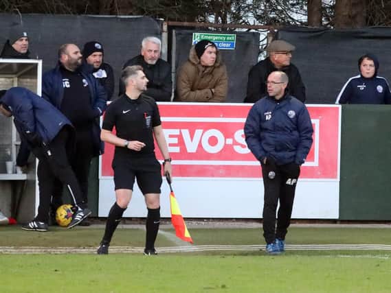 Andy Peaks has an exchange of views with the referee's assistant during AFC Rushden & Diamonds' 2-0 home loss to Rushall Olympic. Pictures by Alison Bagley
