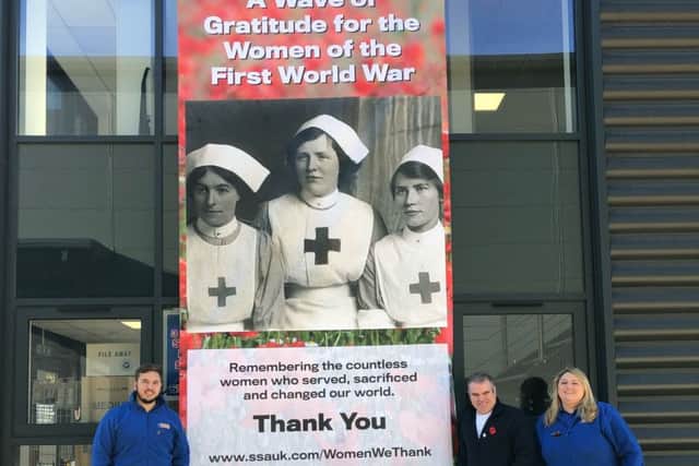 Macaulay Roberts from Kettering Self Store, Giles Coleman from the local Poppy Appeal team and Natalie Hargreaves from Kettering Self Store