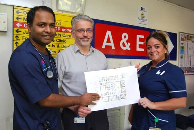 A&E consultant Dr Sareesh Bandapaati, Head of Nursing for Urgent Care, David Anderson and A&E Sister Sarina Vincitore with plans for the expansion. NNL-181211-120358005