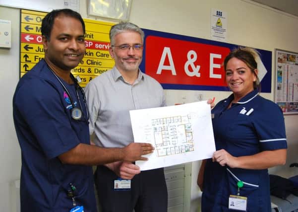 A&E consultant Dr Sareesh Bandapaati, Head of Nursing for Urgent Care, David Anderson and A&E Sister Sarina Vincitore with plans for the expansion. NNL-181211-120358005