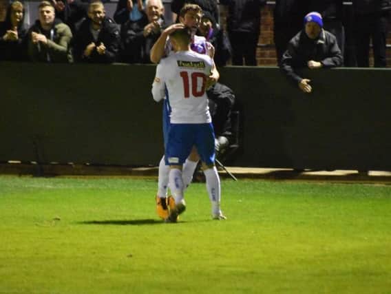 Ben Diamond is congratulated by Sam Brown after he opened the scoring in AFC Rushden & Diamonds 2-1 victory over Hitchin Town at Hayden Road. Picture courtesy of HawkinsImages