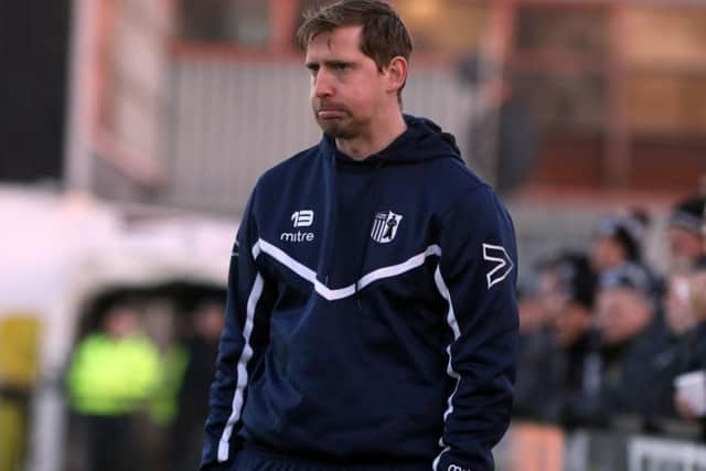 Steve Kinniburgh's expression tells the story as he watches on during Corby Town's 3-1 home defeat to Thame United. Pictures by Alison Bagley