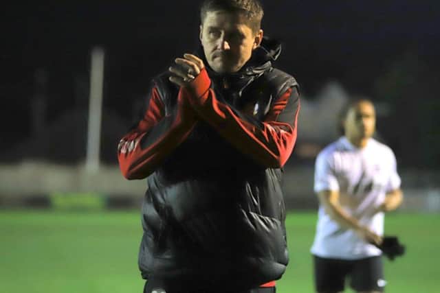 Marcus Law applauds the travelling fans