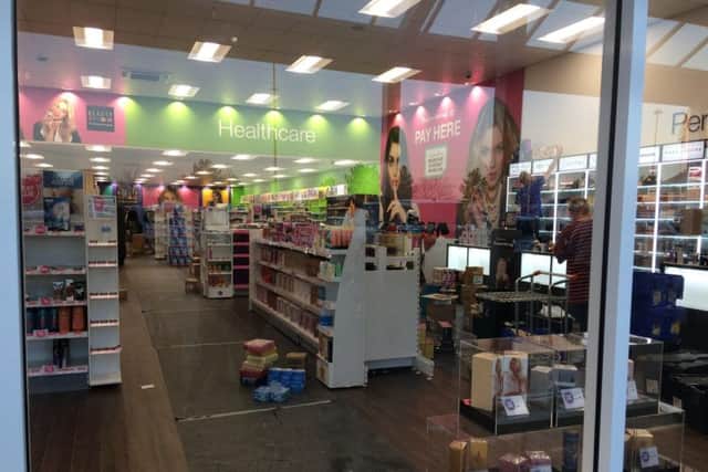 Workers inside the new Superdrug were seen making final preparations this weekend NNL-181118-183046005
