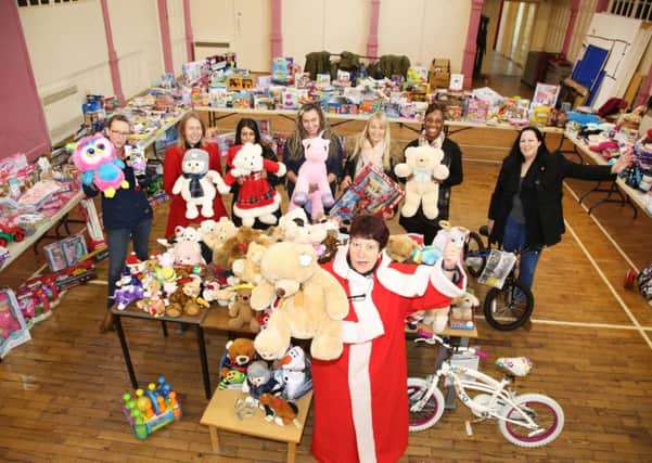 Toy Appeal: Kettering: Northants Telegraph Christmas Toy Appeal Jeanette Walsh as Mother Christmas with the toys donated to vulnerable children across the county.  Tuesday December 12th 2017 NNL-171221-162813009