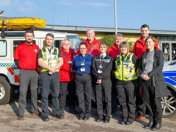 Volunteers of Northamptonshire Search and Rescue with police officers and control roomd staff at the launch of the Herbert Protocol