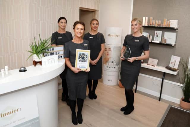 From left, Kelly Hughes, owner Sasha Core, Amber Binder and Becca Chambers