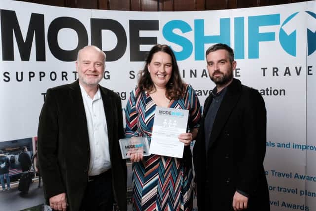 Alison with her award with Phil Smith (left) from Derbyshire County Council who nominated her and Kevin Croasdale (right) the national coordinator for UK Walk to School Week from Living Streets charity. NNL-181122-133925005