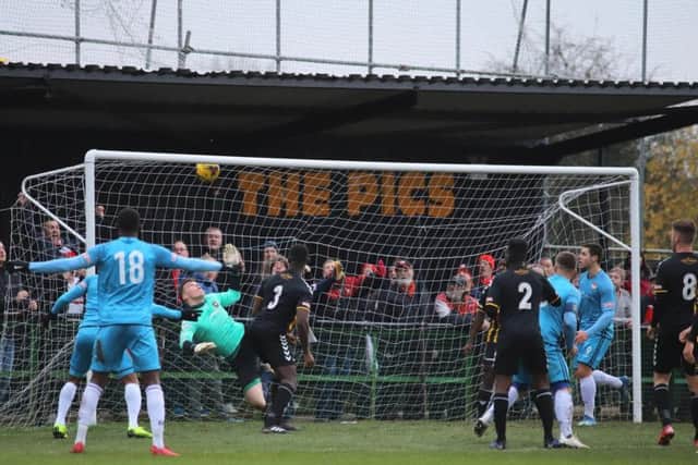 Michael Richens' header hits the net as the Kettering Town captain grabbed the only goal of the game to secure a 1-0 success at Rushall Olympic. Pictures by Peter Short