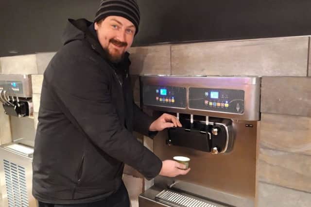 Manager Christopher James with the frozen yoghurt machines. NNL-181128-151731005
