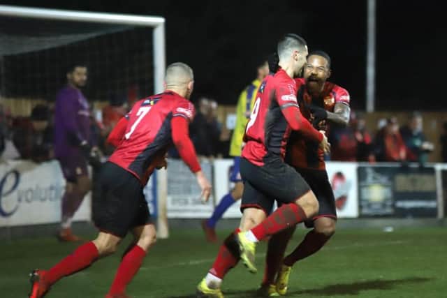 Dan Holman celebrates one of his two goals in Kettering Town's 4-4 draw against Redditch United. Picture by Peter Short