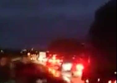 A still from a video shows the extent of queues after the crash. NNL-181129-163945005