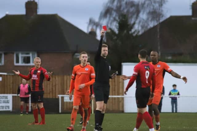 Dan Holman is shown the red card during Kettering Town's 3-0 home defeat to St Ives Town. Picture by Peter Short