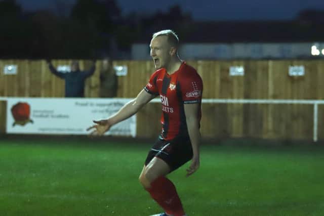 Marcus Kelly shows his delight after scoring Kettering Town's third goal in the 3-0 win over Lowestoft Town last weekend. Picture by Peter Short