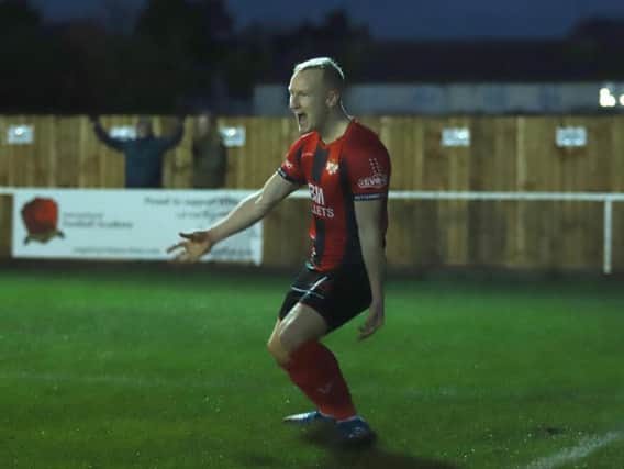 Marcus Kelly shows his delight after scoring Kettering Town's third goal in the 3-0 win over Lowestoft Town last weekend. Picture by Peter Short