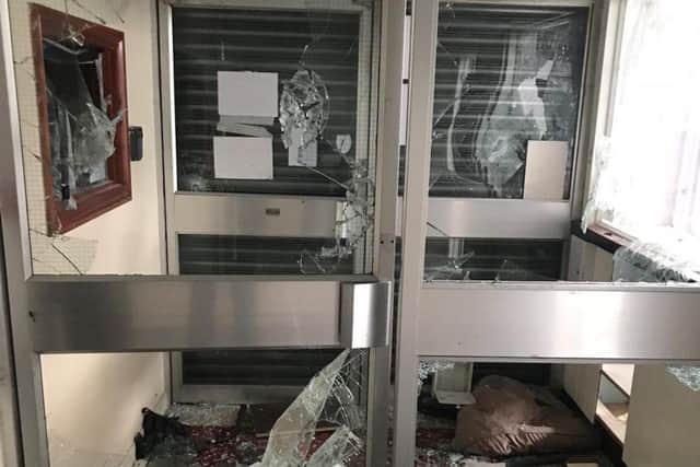 The front doors at the Connaughty Centre had been smashed to smithereens NNL-181221-153937005