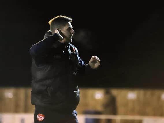 Marcus Law gestures to the Kettering Town fans following the 5-0 success over Hitchin Town at Latimer Park. Pictures by Peter Short