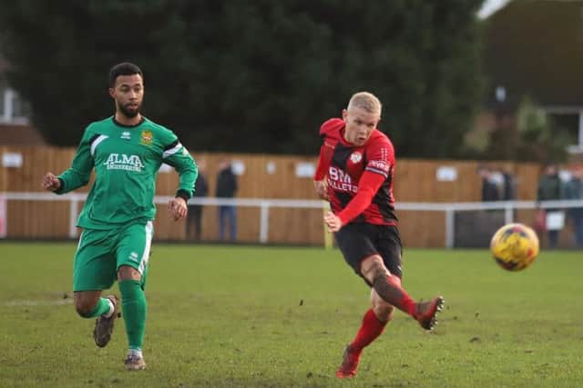 Lindon Meikle lets fly with a stunning strike, which gave the Poppies the lead against Hitchin