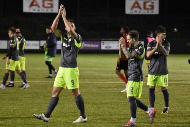 The AFC Rushden & Diamonds players applaud their fans following the 2-2 draw at Redditch United. Pictures courtesy of HawkinsImages