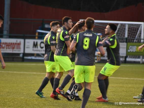 The AFC Rushden & Diamonds players celebrate Declan Rogers' goal during the 2-2 draw at Redditch United. Picture courtesy of HawkinsImages