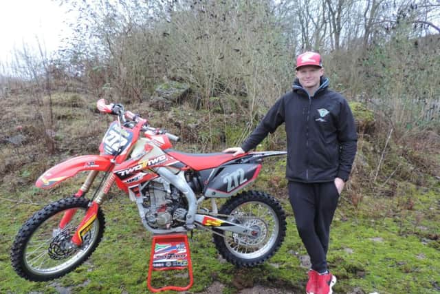 Winner Neville Bradshaw with his 2008 Honda CR450 prepared by former British moto cross
champion Neil Prince. Kitted out in Fox riding gear by Mick Berrill Motorcycles, Bradshaw is
reckoned to be one of the top six riders to come out of South Africa. NNL-181227-130502005