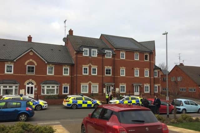 Officers are at the scene in Crispin Court. NNL-190301-110305005