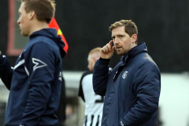 Steve Kinniburgh's Corby Town made it four wins in a row by beating Kidlington 3-1 at Steel Park. Pictures by Alison Bagley