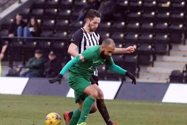 Greg Ling battles for possession